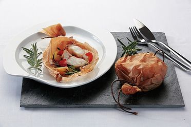 Fisch in der Backpapierhülle