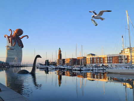 Havenansicht von Bremerhaven mit Oktopus auf dem Hotel und Loch Ness im Wasser